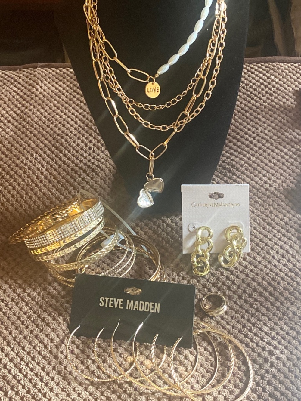 Bundle gold tone necklace, bracelet, ring size 7, earrings and hoops